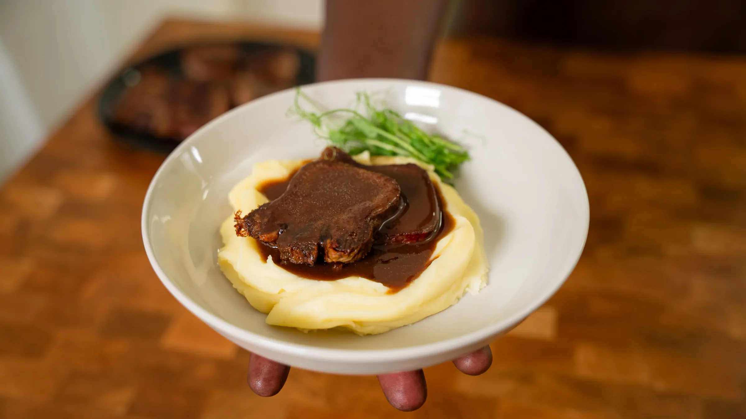 Beef tongue with mashed potatoes and red wine sauce.