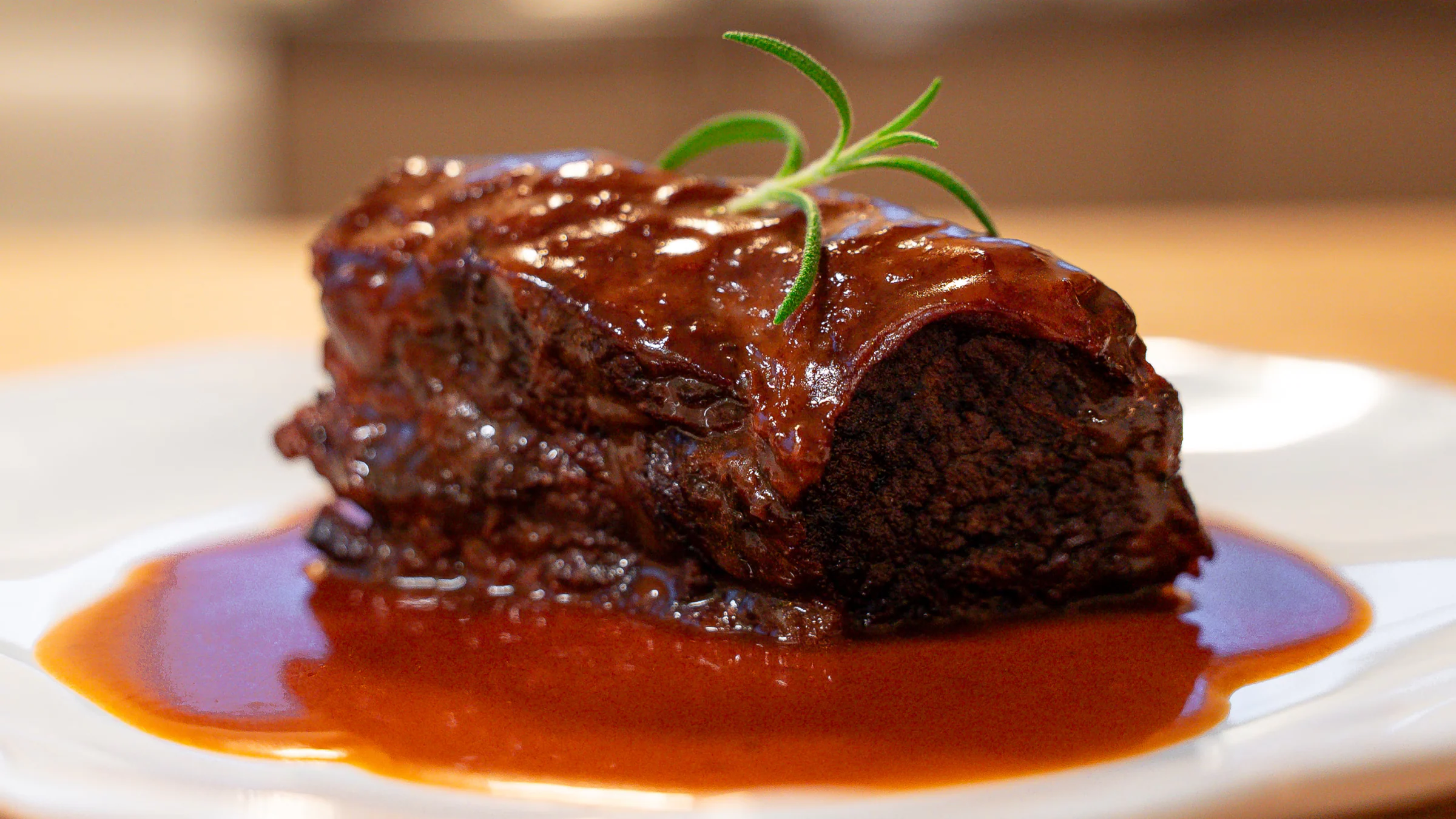 Short ribs braised in wine with pomegranate and homemade beef stock.