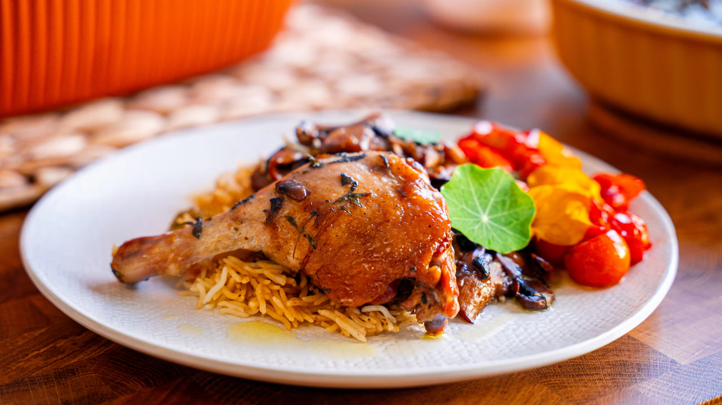 Slow-cooked duck legs in a clay pot with basmati rice and mushrooms.