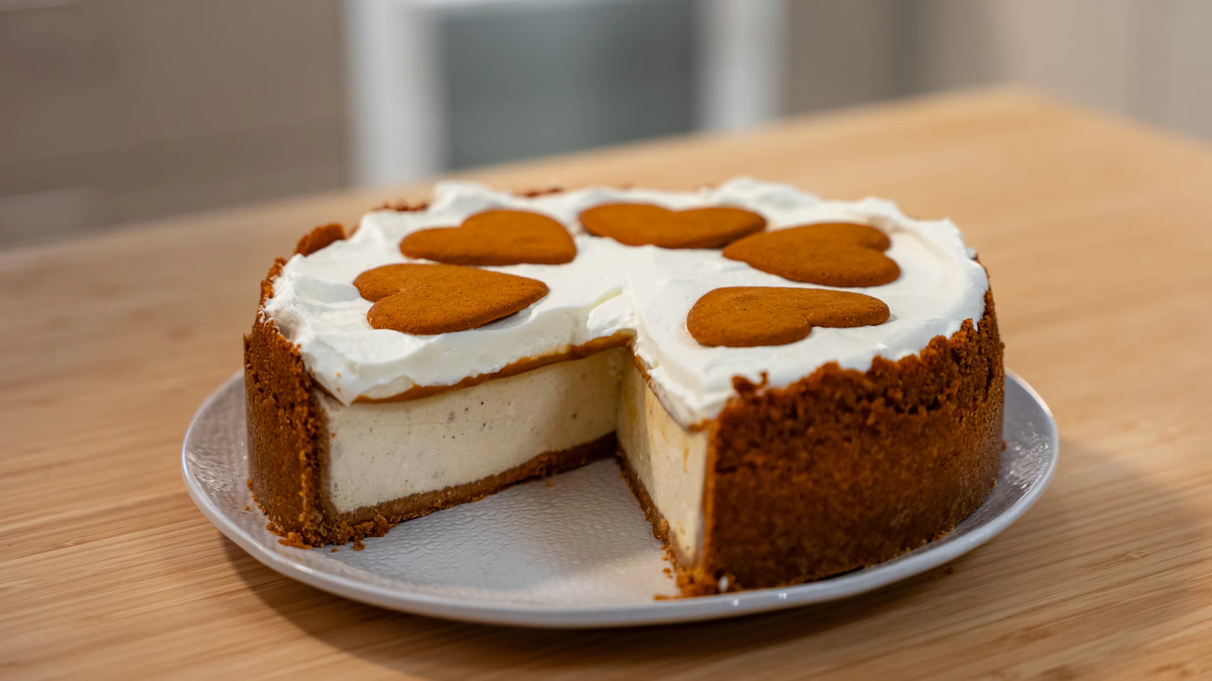 Gingerbread cheesecake with dulce de leche and whipped cream.