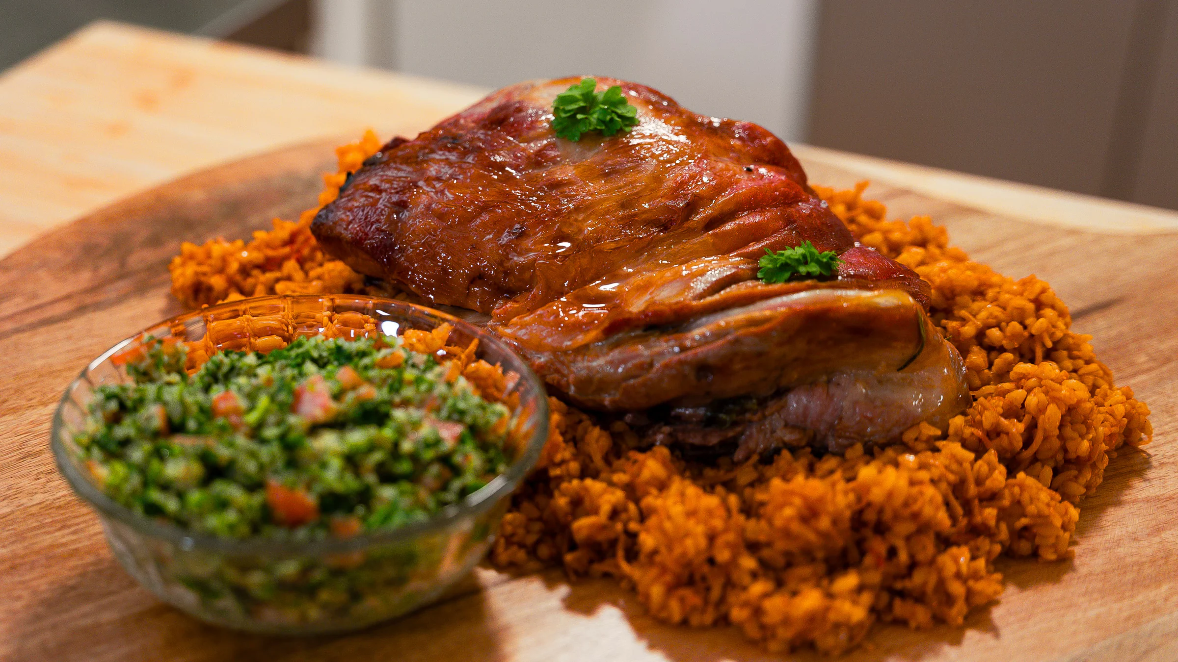 Kuzu tandır (slow-cooked lamb) with bulgur and tabbouleh.