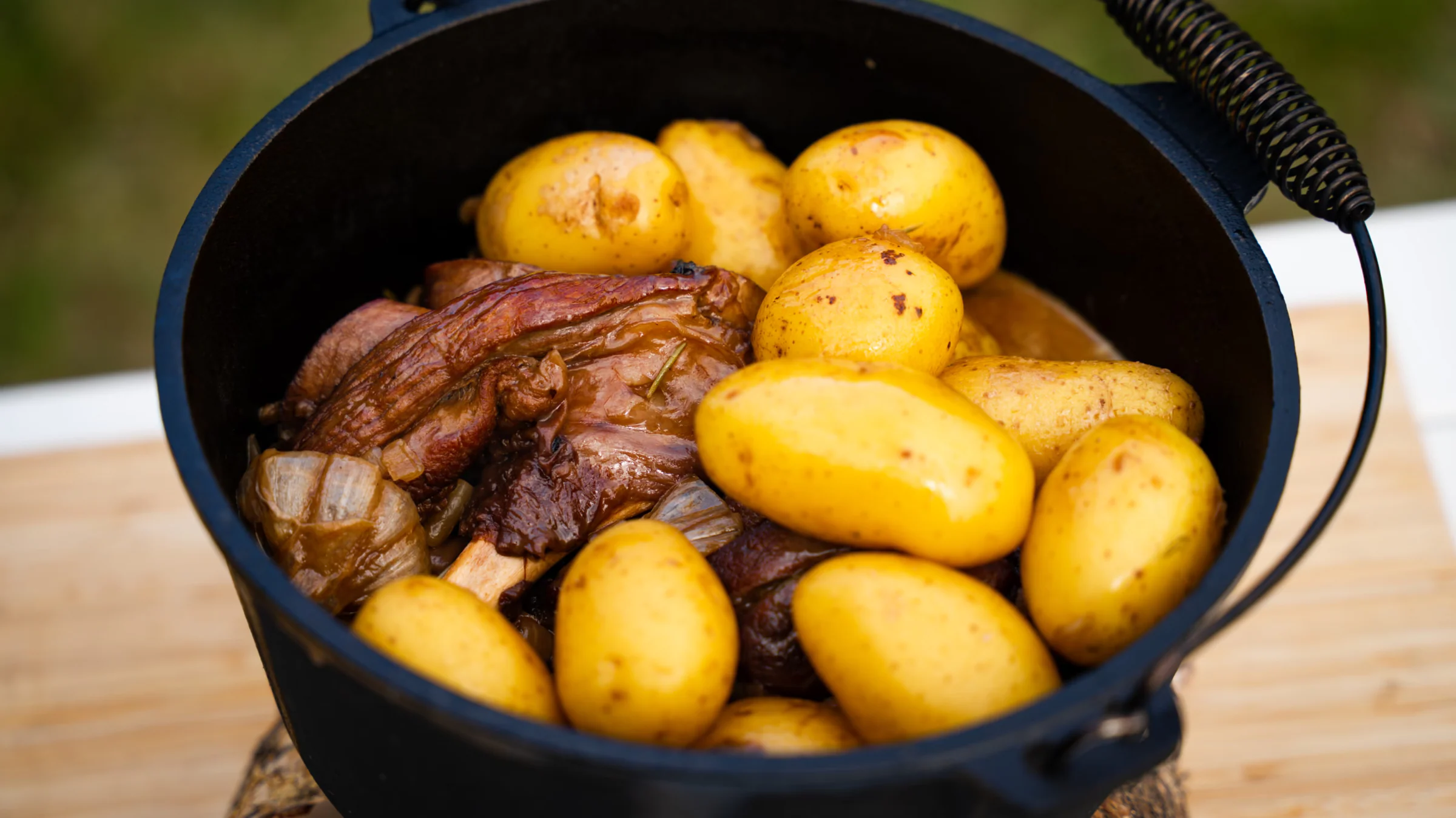 Slow-cooked lamb shanks in a Dutch oven.