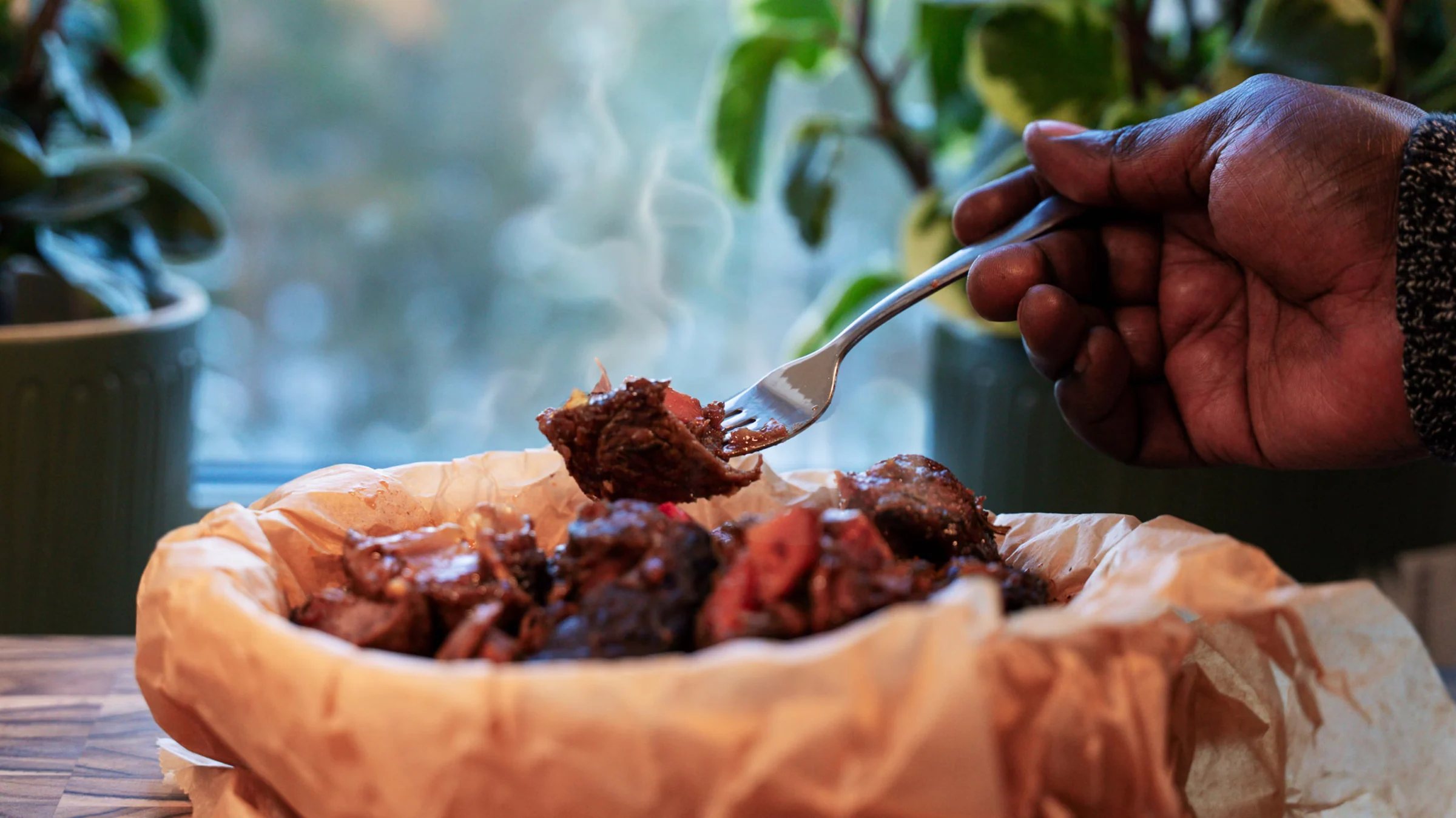 Pomegranate lamb luwombo.