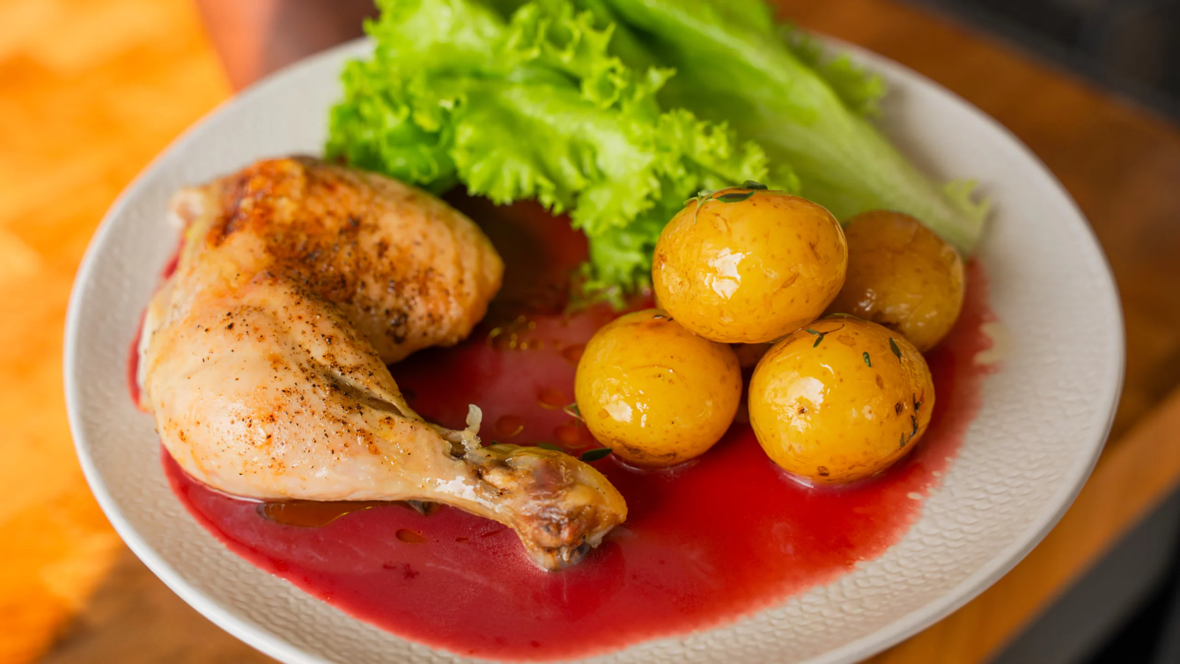 Rhubarb chicken with confit potatoes.