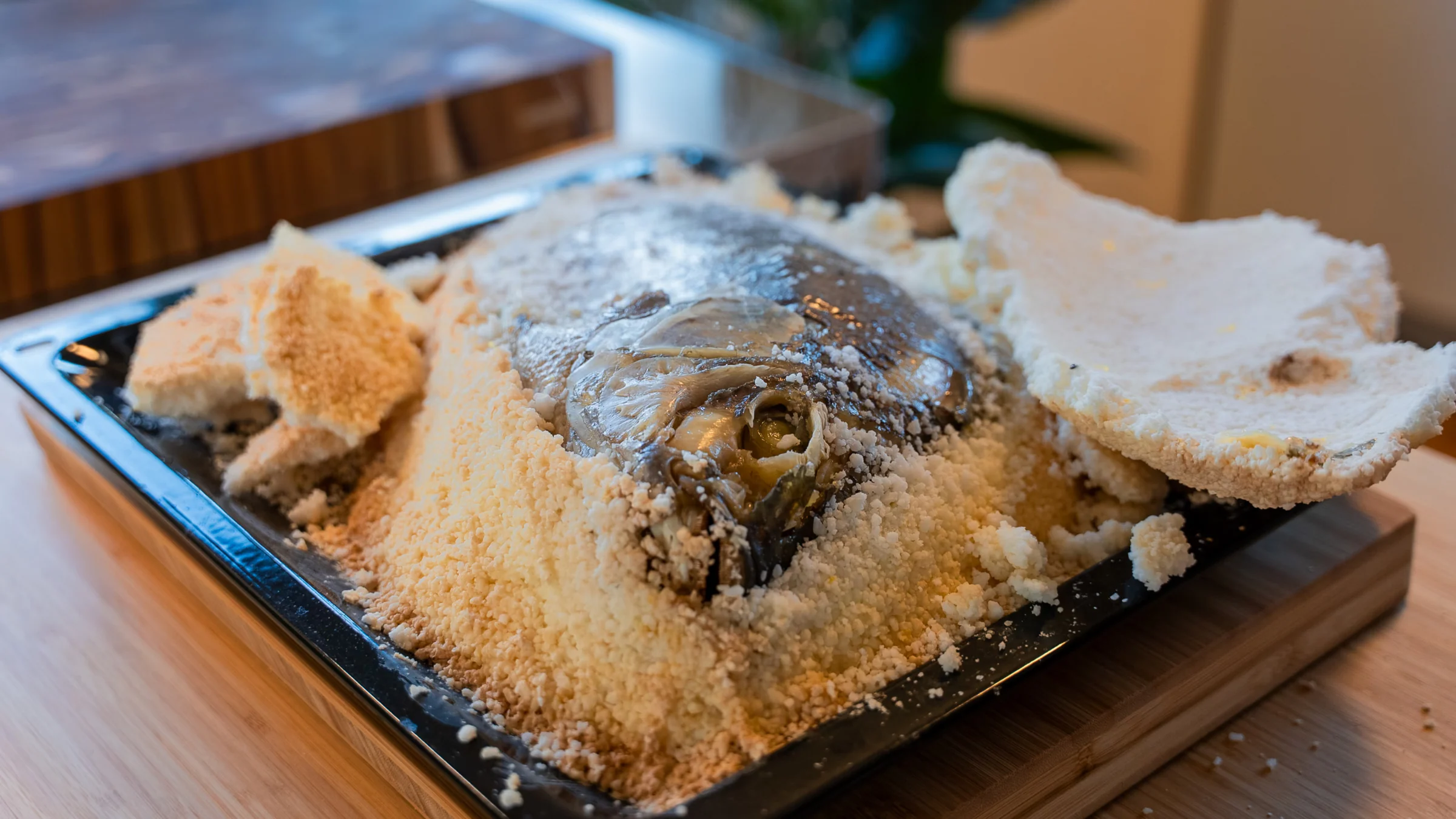 Salt-baked fish.