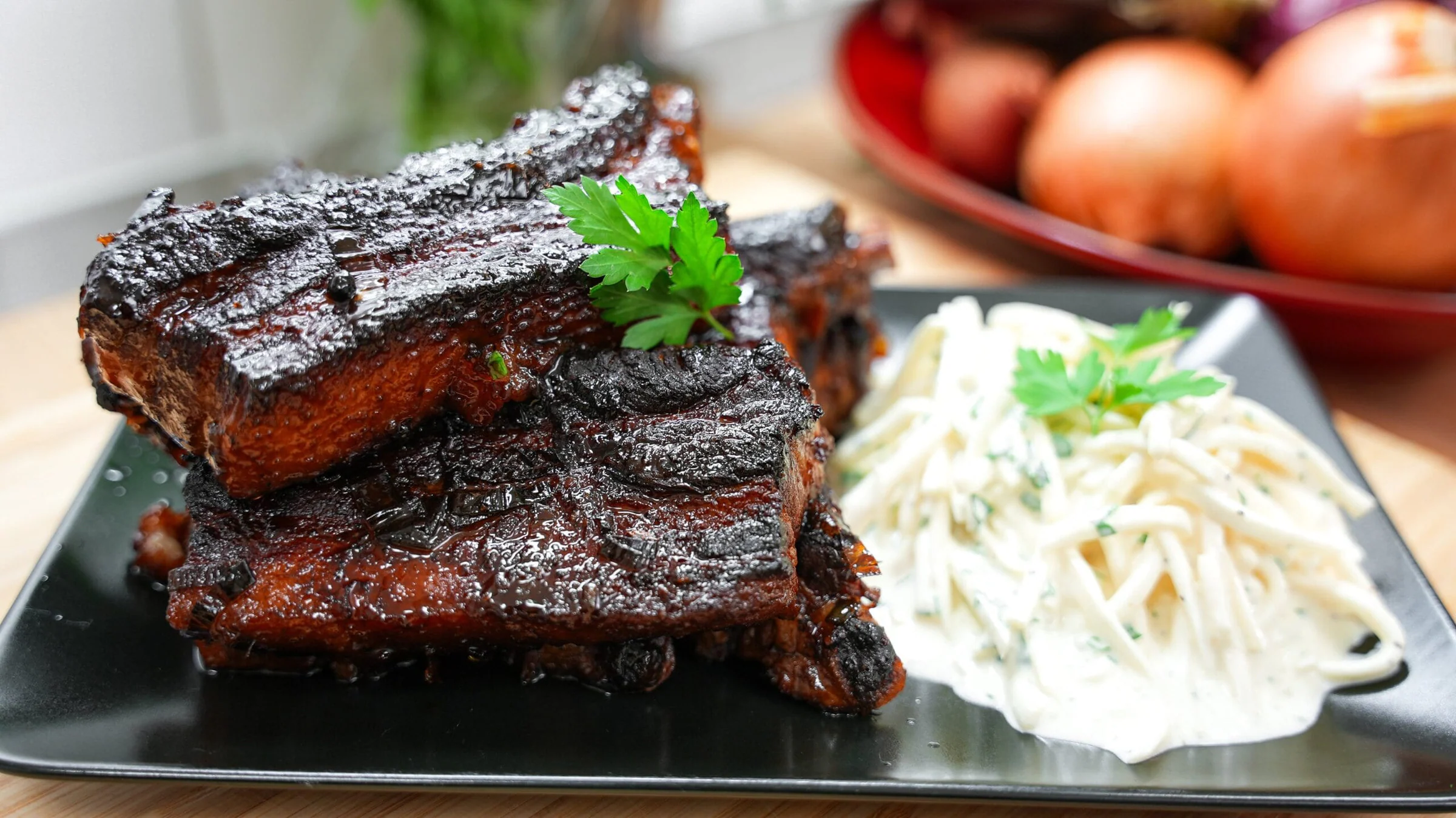 Sticky pork ribs with celery root coleslaw.