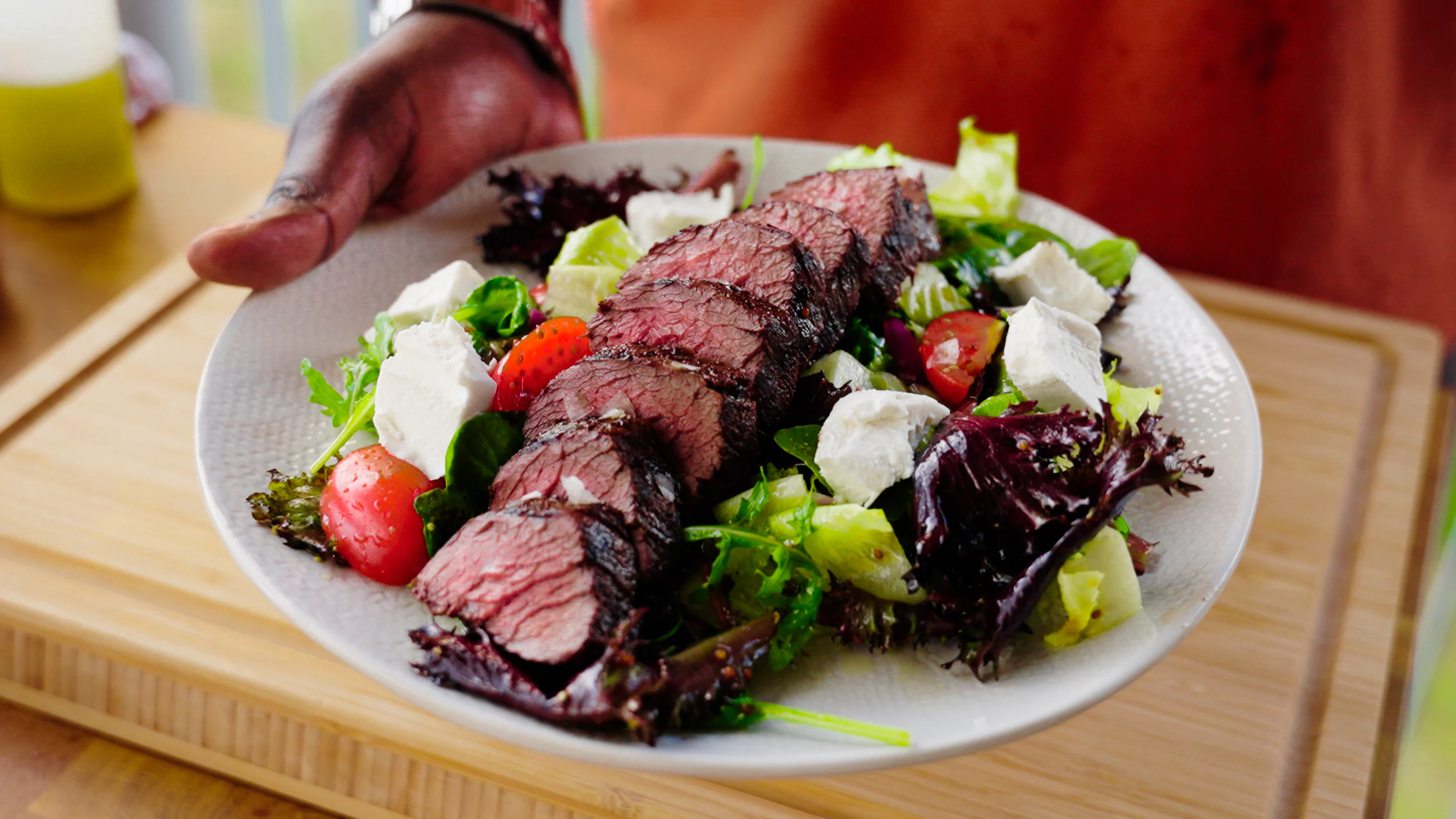 Pan-seared kangaroo fillets with honey mustard salad.