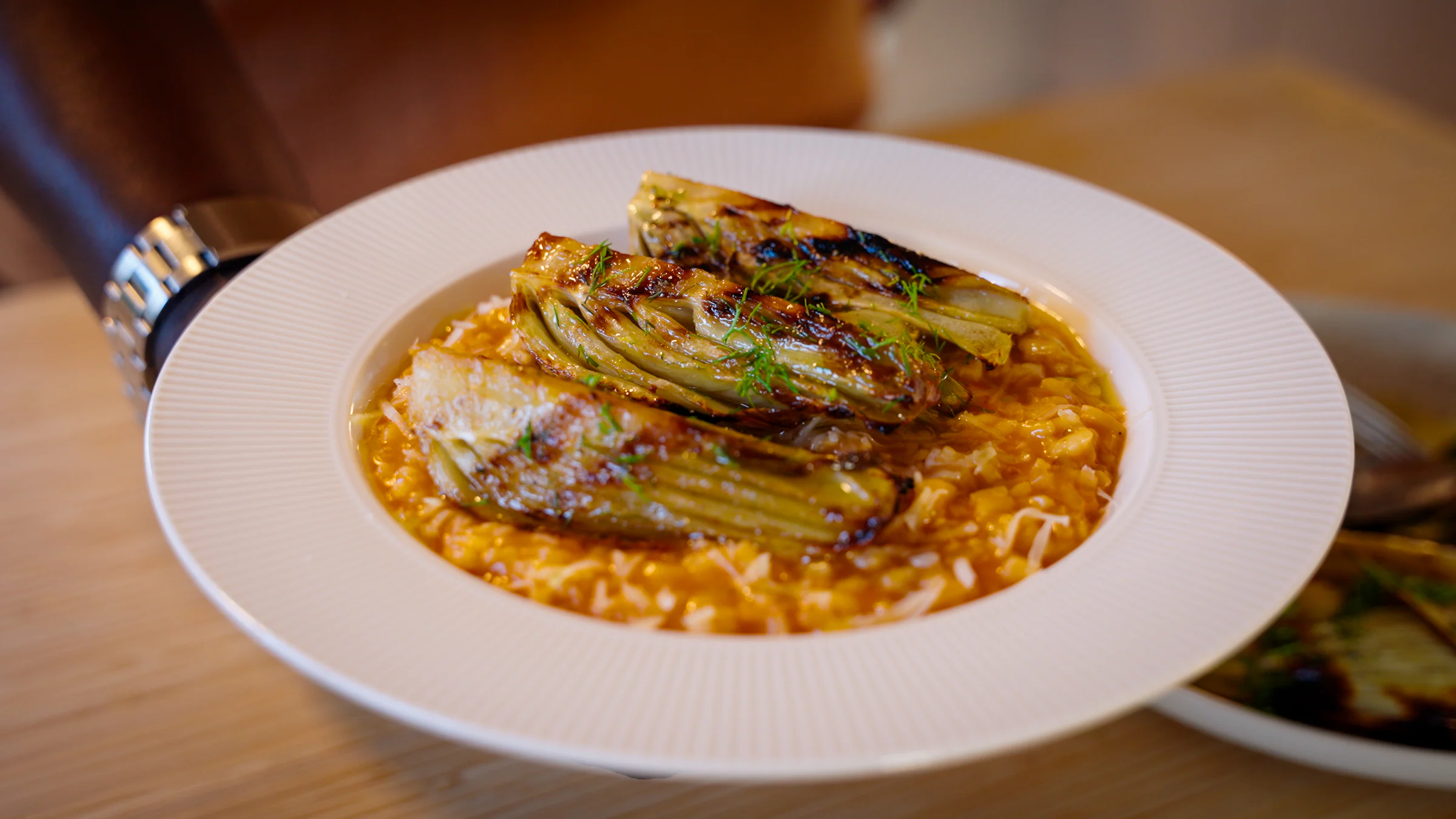 Creamy leek risotto topped with tender roasted fennel.